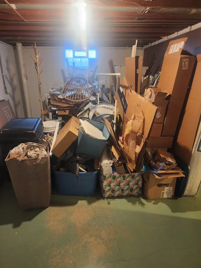 Roll-off dumpster container at job site for Construction Dumpster Rental in East Rockingham